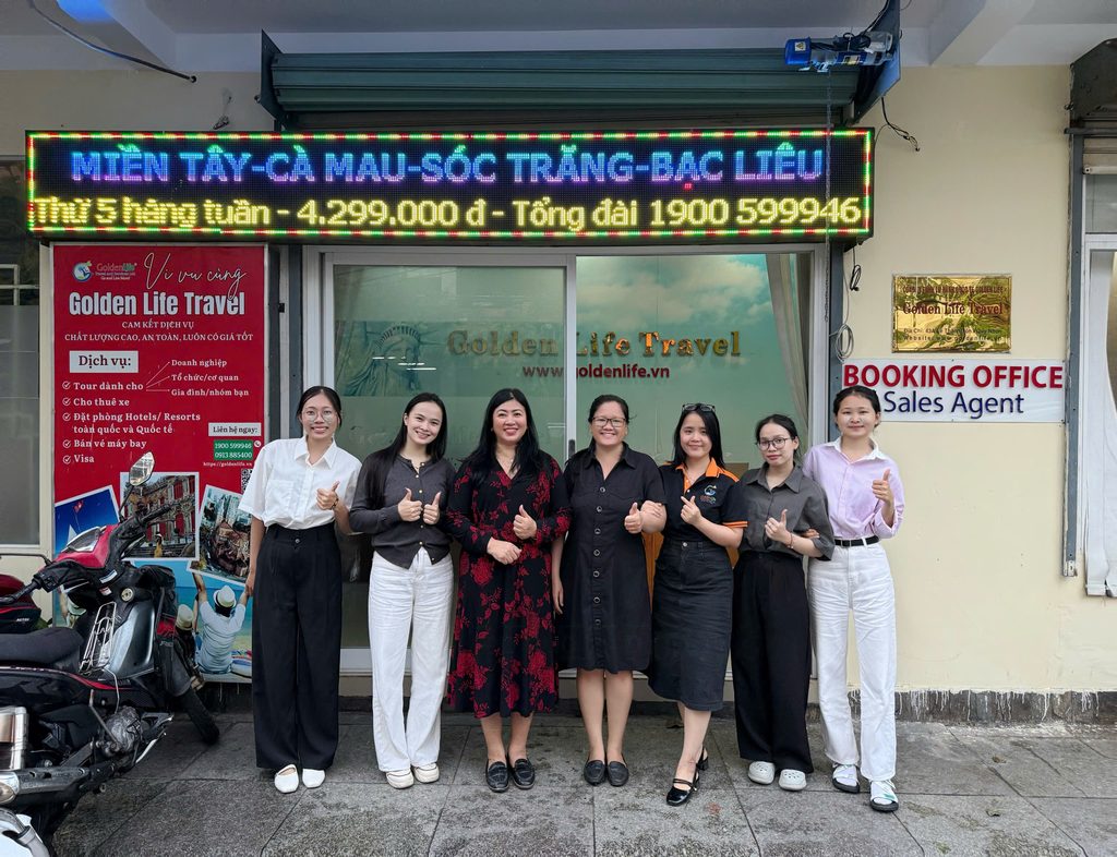 Team photo taken in front of the Golden Life Travel office in Quy Nhon, Vietnam. Used in the introduction to our local team and Vietnam DMC services.